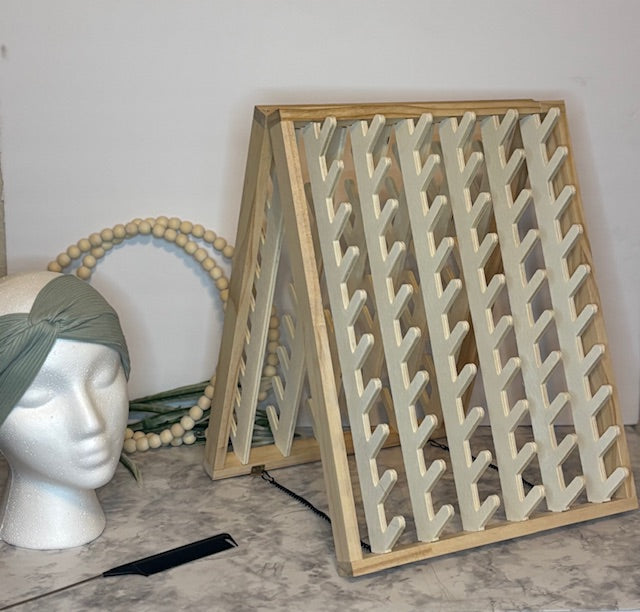 120 peg Hair stand  and 10 pack of individual wrapped fine tooth combs