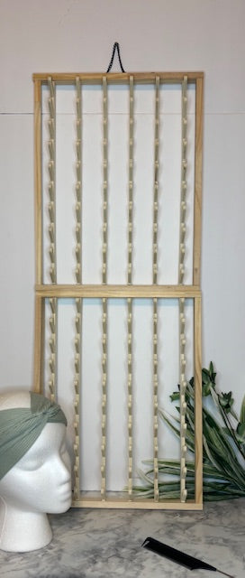 120 peg Hair stand  and 10 pack of individual wrapped fine tooth combs