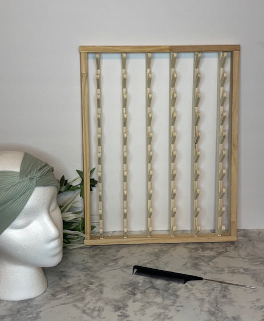 120 peg Hair stand  and 10 pack of individual wrapped fine tooth combs